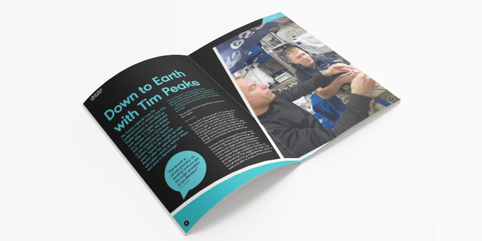 A print spread showing an article titled 'Down to Earth with Tim Peake'. There is a photo on the right-hand page of Tim Peake and another man in a spacecraft.