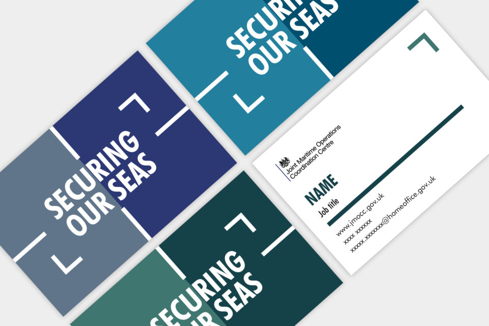 Mock ups of business cards showing the maritime branding, with the wording 'securing our seas'